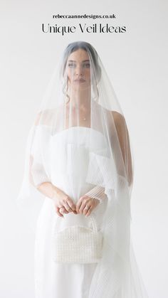 a woman wearing a veil and holding a white purse with the words unique veil leaks on it