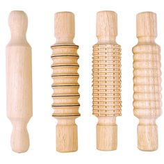 four different types of wooden objects on a white background