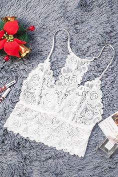 Tag: NoneCategory: Lingerie>BralettesSpecial Use: exotic apparelPackage Contents: 1 x topSize Type: regularPattern: patchworkStyle: sexyColor: whiteBrand: NonePackage: each piece in one pp bagDecoration: laceNeckline: hammockOccasion: bedtimeMaterial: 95%Polyester+5%SpandexDetail¢Floral pattern all over¢Transparent bodice which is very sexy¢Adjustable spaghetti straps¢Seductive deep v neckline¢Perfect to pair with pants¢Sexy bralettes. gorgeous lace styles wholesaleSize Chart (INCH) Sizes Waist White Lace Trim Camisole Crop Top, White Lace Top Camisole, White Lace Patchwork Cami Top, White Lace Trim Camisole Bra, White Camisole Bra With Lace Trim, White Camisole With Lace Patchwork, White Lace Camisole Crop Top, White Lace Trim Crop Top For Party, White Lace Patchwork Crop Top