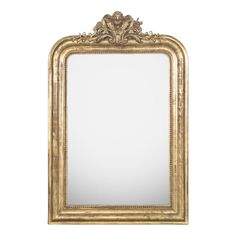 an ornate gold framed mirror against a white background