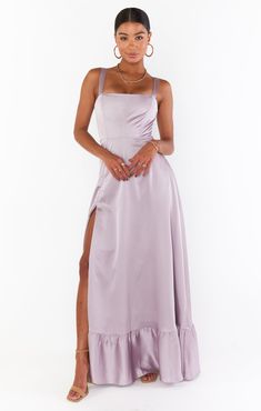 Get swept away by romance in the Clarissa Corset Dress. Beautiful tiers of luxe satin fall to a maxi hem with side slit, topped with a figure flattering corset bodice! Let her be the statement of your look paired with dainty jewelry and barely there heels. Dusty Purple Bridesmaid Dresses, Tan Bridesmaid Dresses, Beige Bridesmaid Dress, Metallic Bridesmaid Dresses, Maternity Dress Wedding Guest, Beige Bridesmaids, Rustic Bridesmaid Dresses, Light Pink Bridesmaid Dresses, Pastel Bridesmaid Dresses