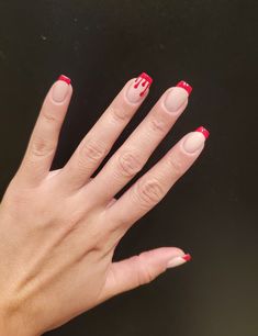 These bloody red french tip nails creates an edgy look. Perfect for Halloween, costume parties, and more. Unleash your inner vampire and make a haunting statement with this cute, confident, and bold nail look! #halloweeninspo #halloweennails #halloween #bloodynailinspo #nailinspo #nails #manicure #octobernails #redfrenchtip #rednails #manicure #fallnails Vampire French Tip Nails, Blood Drop Nails, Simple Blood Nails, French Tip With Blood Nails, Blood Splatter Nails French Tip, Blood Tipped Nails, Blood Drip Nails, Halloween Nails Blood Drip, Halloween Nails Easy