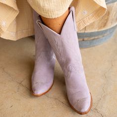 The KARIMA cowgirl boot for women is a gorgeous addition to any ensemble. Made of soft, luxurious suede in a beautiful lilac color, these boots will make a statement wherever you go. Perfect for any occasion, they'll make you feel pretty and confident every time you slip them on. Height: 13" Purple Snip Toe Boots For Fall, Purple Ankle Boots For Spring, Purple Ankle Heeled Boots For Fall, Fall Purple Ankle Heeled Boots, Purple Leather Heeled Boots For Fall, Purple Leather Spring Boots, Fitted Purple Ankle Boots, Fall Purple Leather Heeled Boots, Spring Purple Leather Boots