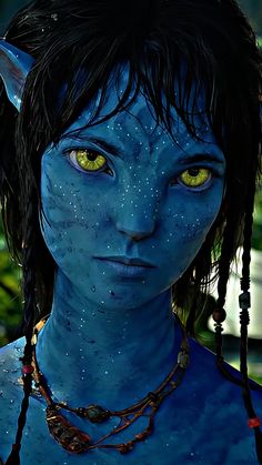 a close up of a person with blue skin and yellow eyes, wearing necklaces