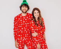 Share festive moments with your special someone in our Couples Christmas Pajamas! Perfect for lazy holiday mornings, opening gifts, or surprising your girlfriend or fiancé with a unique gift. Crafted from butter-soft fabric, our His and Hers Jammies blend comfort with festive cheer, creating magical moments to cherish forever.  ☀️ WE'RE GRATEFUL YOU'VE CHOSEN US!  We offer: ● Fast Shipping ● High Quality Products ● A Great Customer Service We're dedicated to offering top-notch styles for you and Family Matching Red Christmas Sets, Family Matching Red Christmas Sleepwear, Family Matching Holiday Red Sleepwear, Red Family Matching Holiday Sleepwear, Festive Family Matching Red Sleepwear, Red Christmas Pajama Party Set, Red Holiday Loungewear Sets, Red Christmas Pajama Party Sleepwear, Red Christmas Sleepwear For Pajama Party