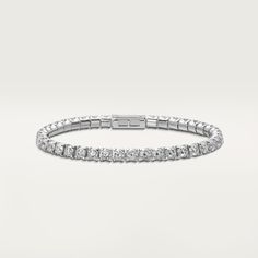 Essential Lines bracelet White Diamond Bracelet In Platinum Luxury Style, Luxury White Platinum Bracelets, White Platinum Diamond Bracelet For Formal Occasions, Formal White Platinum Diamond Bracelet, Classic Cartier Bracelets For Wedding, White Platinum Bracelet With Brilliant Cut, Cartier Round Diamond Bracelet With Brilliant Cut, Cartier Diamond Bracelet For Anniversary, Platinum Diamond Cut White Bracelet