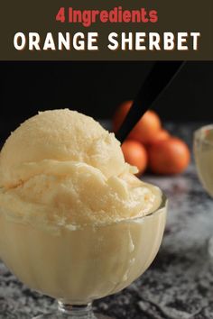 an orange sherbet ice cream in a glass bowl