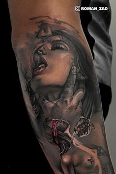 a woman's arm with tattoos on it and an image of a demon in the background