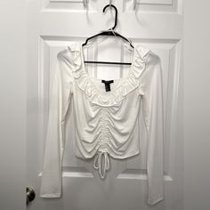 Size S, Still Has Tags. Can Be Worn Off The Shoulder Or On. Forever 21 White Tops With Ruffles, Forever 21 White Ruffled Top, Forever 21 Ruffled Top For Brunch, Forever 21 Ruffled Tops For Spring, Trendy Forever 21 Ruffled Tops, Chic Forever 21 Top With Ruffles, Chic Forever 21 Tops With Ruffles, Forever 21 Long Sleeve Tops For Brunch, Women Button Down Shirt