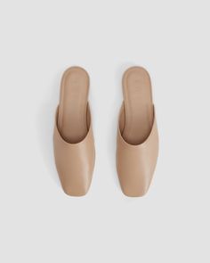 The Leather Day Mule Blush Tan – Everlane Classic Mules With Sculpted Heel For Business, Classic Mules With Padded Heel For Office, Leather Mules With Sculpted Heel, Leather Mules With Sculpted Flat Heel, Classic Leather Mules With Sculpted Heel, Classic Brown Square Toe Mules, Modern Brown Mules With Square Toe, Modern Slip-on Mules With Padded Heel, Office Slip-on Mules With Padded Heel