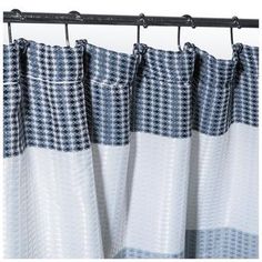 blue and white checkered shower curtain with metal grommet hooks on the side