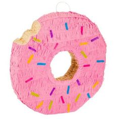 a pink doughnut shaped ornament with sprinkles