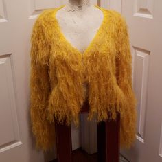 Brand New With Tag, Size Small, Yellow Fringe Sweater. Open Front With Eye Hook Closure. Yellow Fall Party Outerwear, Yellow Spring Outerwear For Party, Spring Yellow Outerwear For Party, Spring Yellow Party Outerwear, Yellow Spring Party Outerwear, Long Sleeve Yellow Blazer For Party, Yellow Long Sleeve Blazer For Party, Casual Multicolor Fringe Outerwear, Fitted Long Sleeve Outerwear With Fringe