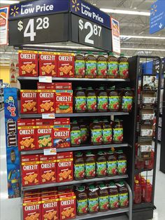 a grocery store shelf filled with lots of food