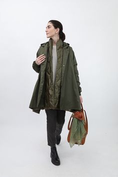 Oversize Outerwear Oversized chic defines the Cortina's signature style renewed in a mid-length raincoat perfect for travel. All-weather-ready, made in our amazing mid-weight, smooth, water-repellent fabric with an easy-wear design that goes over everything - including sweaters and Goose Down. Not just for seasonal rains, pack the Cortina Rain on your next trip - destination: anywhere. Fantastic room to layer or simply wear as comfy, oversized chic. Features include bottom-hem hidden cinch to op Rain Jacket Outfit, Italian Handbags, Italian Shirts, Cashmere Pants, Denim Jewelry, Rain Coat, Oversized Style, Water Repellent Fabric, Chunky Sweater