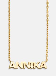 Spell it out with the 18K Gold Mini Nameplate Necklace. This custom name piece features a modern gold chain attached to your choice of a pavé or gold nameplate. Featuring the personalization of your choosing. Crafted with 18K gold plated sterling silver and Cubic Zirconia stones, you'll be wearing it for years to come. Luxury Customizable Nameplate Necklace, Luxury Nameplate Necklace For Personalized Gift, Luxury Personalized Nameplate Necklace, Luxury Gold Name Necklace With Custom Name, Luxury Yellow Gold Name Necklace For Personalized Gift, Luxury Yellow Gold Name Necklace As Personalized Gift, Luxury Gold Nameplate Necklace, Luxury Customizable Nameplate Necklaces, Luxury Personalized Initial Pendant Name Necklace