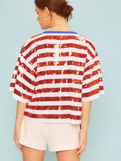 This fully sequin short sleeve top features patriotic red and white stripes and a charming star detail in the center, making it the perfect choice for holiday celebrations like Memorial Day and the 4th of July. The sparkle of sequins will display just the right amount of patriotism and make you stand out in any event. 100% Polyester. Sequin Short, Patriotic Flag, Sequin Shorts, Sequin Fabric, Red And White Stripes, Sequin Top, Holiday Celebration, Short Sleeve Top, Memorial Day