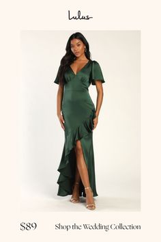 We can't think of a more ideal union than you plus the Lulus Eternal Bond Emerald Satin Ruffled Flutter Sleeve Maxi Dress! Lightweight stretch-woven satin sweeps from short fluttery sleeves into gathered cups with a V-neckline and a set-in waist. A figure-skimming maxi skirt is adorned with flouncy ruffles as it falls to an asymmetrical, high-low hem. Hidden back zipper/clasp. Fit: This garment fits true to size. Length: Floor length. Size medium measures 59" from shoulder to hem. Bust: Great for any cup size. Waist: Fitted - very fitted at natural waist. Hip: Fitted - consider sizing up for fuller hips. Undergarments: May be worn with any standard bra. Fabric: Fabric has no stretch. Lined To Mid-thigh. Dress Measures 21" Longer At Back. Shell: 100% Polyester. Lining: 100% Polyester. Hand Emarald Green Dresses, Flowy Dress With Sleeves, Fitted Flutter Sleeve Maxi Dress For Date Night, Fitted Maxi Dress With Flutter Sleeve For Date Night, Green Satin Dress Lulus, Fitted Maxi Dress With Ruched Detail And Flutter Sleeves, Fitted Ruched Maxi Dress With Flutter Sleeves, Green Flutter Sleeve Dress, Satin Bridesmaid Dresses With Sleeves