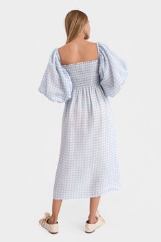 The bestselling Atlanta dress from Sleeper is a fashionista favorite. Perfect for brides' getting ready looks or mamas-to-be at their baby shower, this 100% linen dress features a square neckline and smocked bodice in a blue gingham print. The Atlanta midi's romantic, blouson sleeves can be worn on or off the shoulder. Comes with a matching hair scarf. Available in lavender, blue vichy and ivory silk. Baby Shower Dress Blue, Baby Shower Dress, Spring Wear, Loungewear Luxury, Baby Shower Dresses, Ivory Silk, Blue Gingham, Gingham Print, Scarf Hairstyles