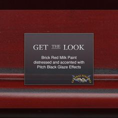 a plaque on the back of a red piano that says, get the look brick red milk paint distressed and accented with pitch black glaze effects