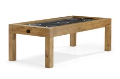 a wooden table with an air hockey board on it's top and two holes in the bottom