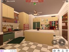 a virtual view of a kitchen and dining room in an open floor plan with ceiling fan