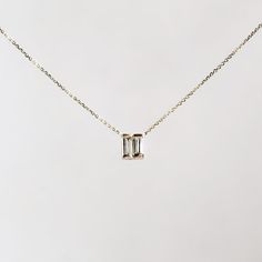 14k Gold Tiny Diamond Baguette Necklace Dainty Baguette Cut Jewelry, White Gold Emerald-cut Baguette Diamond Jewelry, 14k Gold Baguette Diamond Jewelry, White Gold Emerald Cut Baguette Diamond Necklaces, Timeless 14k Gold Baguette Cut Necklace, Modern Baguette Diamond Necklace For Anniversary, Modern Baguette Diamond Cut Jewelry, Minimalist Baguette Diamond Anniversary Jewelry, Minimalist Emerald Cut Single Diamond Jewelry