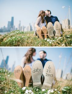 a couple sitting in the grass with their wedding date written on them's shoes