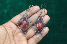 Excellence Dangle Copper Wire Wrap Earrings, Beautiful Red Chalcedony Earrings, Banjara Tribal Look Earrings Jewelry, Christmas Gift Jewelry ITEM DETAILS  Item Type ~ Earrings Gemstone  Name - Chalcedony  Earrings Style - Dangle   Earrings Height - 7.4 Centimeter  Earrings Width - 3.2 Centimeter Metal ~ Copper Wire  Quantity ~ 1 Piece Wire Wrap Earrings, Chalcedony Earrings, Wrap Earrings, Earrings Gemstone, Jewelry Christmas, Wire Wrapped Earrings, Christmas Gift Jewelry, Gift Jewelry, Wire Wrap