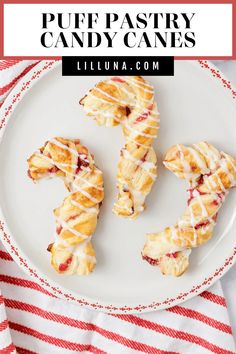 three puff pastry candy canes on a white plate