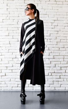 Long black and light grey stripe coat - METC0038 Stripes are a must have this season and with a coat like that, your winter will be a fashion show. The asymmetric shape and the placement of the zipper make this coat a stand-out, statement piece while the back is plain with just a hint of leather Oversized Striped Outerwear For Layering, Fall Outerwear With Contrast Stripes, Fall Black Outerwear With Contrast Stripes, Chic Striped Winter Outerwear, Striped Outerwear For Winter Layering, Striped Oversized Outerwear For Work, Winter Striped Outerwear For Layering, Spring Striped Outerwear For Layering, Winter Striped Outerwear With Contrast Stripes