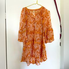 Super Cute And Perfect For Vacation. Can Fit Xs To M Orange Floral Print Dress For Beach, Orange Tunic Dress For Beach Cover-up, Fitted Tunic Dresses For Brunch, Fitted Tunic Summer Dress, Summer Fitted Tunic Dress, Spring Tunic Beach Dress For Brunch, Spring Brunch Tunic Beach Dress, Summer Mini Dress In Orange, Orange Dress For Spring Beach Cover-up