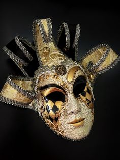 Whimsical and colorful this gold black tone Jester mask is inspired by the traditional Venetian Carnival. This mask features vibrant colors, intricate designs, and exaggerated features to convey a sense of playfulness and jest. Circus Mask, Glam Halloween Party, Jester Halloween, Victorian Circus, Masquerade Mask Women, Jester Mask, Glam Halloween, Venetian Carnival Masks, Fantasy Ideas