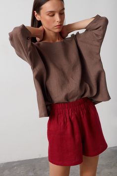 "ISLA is a high waist linen shorts. DETAILS - High waist - Elasticated waist - Side seam pockets - Oeko-Tex certified 100% lightweight linen - Cut and sewn to order just for you in our studio COLOR - Cherry Red, you can also choose other colors above - Fabric samples are available here https://www.etsy.com/listing/586569696/linen-fabric-samples SIZING & FIT - Fits true to size - Model is 5'9.5\" / 177cm and wears size XS CARE FOR LINEN - Machine wash up to 30ºC/86ºF gentle cycle - Lay flat to dr Summer Linen Tops With Short Shape, Summer Linen Short Tops, Summer Short Linen Tops, Short Length Linen Tops For Summer, Chic Short Linen Tops, Linen Tops With Pockets, Short Length, Short Linen Tops With Pockets, Short Length Linen Tops With Pockets, Linen Wrap Top