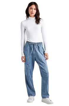 Every closet craves these drawstring-waist chambray pants that are both cool and comfortable. 15" leg opening; 9 1/2" front rise; 14 1/2" back rise Elastic/drawstring waist Five-pocket style 85% cotton, 14% linen, 1% elastane Machine wash, tumble dry Imported Relaxed Bottoms With Drawstring For Fall, Relaxed Drawstring Bottoms For Fall, Relaxed Fit Bottoms With Drawstring For Fall, High Rise Bottoms With Drawstring And Relaxed Fit, High Rise Relaxed Fit Bottoms With Drawstring, Wide-leg Denim Bottoms With Drawstring, Wide Leg Denim Bottoms With Drawstring, Denim Blue Drawstring Straight Leg Bottoms, Spring High Rise Pants With Drawstring