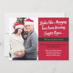 a christmas card with an image of a pregnant couple