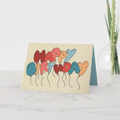 a happy birthday card with balloons on it