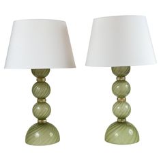 two green lamps sitting next to each other