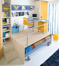 a room with a bed, desk and shelves