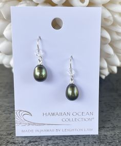 A classic freshwater pearl earring to accentuate your style. We match each pearl by hand, but just like you, each pearl is unique. Length: 0.6" Materials: 9mm Freshwater Pearl. Czech Fire Polish Bead. Sterling silver ear wires. Collection: Hawaiian Ocean Collection Pearl Dangle Earrings With French Hook, Classic Pearl Earrings With French Hook, Classic Teardrop Nickel-free Pearl Earrings, Oval Pearl Drop Earrings Gift, Classic Pearl Earrings With French Hook As Gift, Gift Pearl Earrings With French Hook, Classic Silver Tahitian Pearl Earrings, Nickel-free Teardrop Pearl Earrings, Silver Tahitian Pearl Drop Earrings