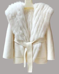 MODA  FURS   FABULOUS FUR FASHIONS AT UNBEATABLE PRICES   Women's Warm and Cozy 100% Wool Jacket with Fixed Hood  Warm and Cozy White Fox Fur Lining Side Pockets, Front Closures and Detachable Belt Length: 29" S/M     CONDITION CHART: FUR RESTYLING SERVICES:       SERVICES: Brand New    Never used or Worn Showroom New  Showroom Item / Not Pre-Owned Refurbished New 2 Excellent fur coats dramatically remodeled to an updated fresh design as if it was just bought yesterday! Excellent/Perfect/Superb Fabulous Furs, Fur Coats Women, Fox Fur Coat, Fur Fashion, Cashmere Coat, White Fox, Hooded Coat, Soft Texture, Fox Fur