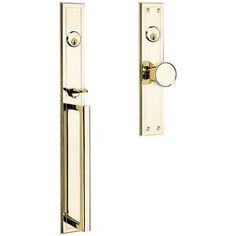 an image of a door handle with knobs on the front and back doors in polished brass