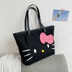 This cute hello kitty canvas tote bag, is a must-have accessory to make every day special! This high quality large canvas tote is perfect for school, shopping or traveling. Size: 40 x 28 x 13 cm Kawaii Hello Kitty Print School Shoulder Bag, Cute Hello Kitty Print School Shoulder Bag, Trendy Hello Kitty Rectangular Shoulder Bag, Trendy Hello Kitty Shoulder Bag, Trendy Hello Kitty Print Rectangular Shoulder Bag, Trendy Rectangular Hello Kitty Shoulder Bag, Trendy Hello Kitty School Bag, Trendy Hello Kitty Shoulder Bag For School, Cute Canvas Bag For Daily Use