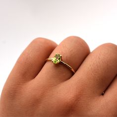 Details: Metal: Available in 14k White, Yellow, and Rose Gold Stone: 6mm x 4mm Natural Peridot Size: Available from Size 4 to Size 9 All Diamonds and Gemstones Are Responsibly and Ethically Sourced Peridot Ring Gold, Jewelry Staples, Authentic Jewelry, Peridot Jewelry, 14k Rose Gold Ring, Jewelry Picture, Peridot Ring, Amethyst Jewelry, Put A Ring On It