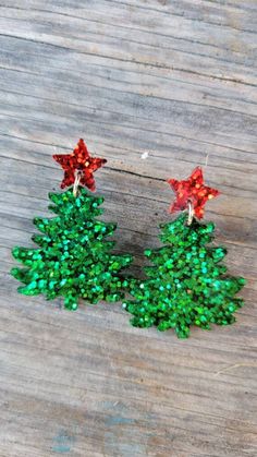 "Ready to start having some fun ! Sparkly Christmas Tree Earrings  Art Minded earrings are simplybeYOUtiful 💙 Comfortable to wear because they are incredibly lightweight ! Stainless steel ear wire for sensitive skin Handmade earrings by Local Artist off the east coast of Florida 🌴                   MIX & Match     **SALESALESALE** Your items will ship FAST! Spend $35 or more and your order ships out for FREE ! Gifting a friend? Each and every pair of earrings from my shop will come individuall Red Earrings For New Year Party, Red Christmas Earrings For Party, Red Holiday Earrings For Festive Occasions, Red Festive Earrings For The Holiday Season, Red Festive Holiday Earrings, Red Earrings For Christmas Party, Red Holiday Festive Earrings, Red Glitter Earrings For Party, Red Glitter Party Earrings