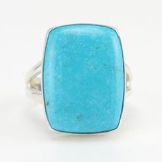 Sku 11573 This rectangular turquoise gemstone is from Arizona and is set into a sterling silver bezel setting in Bali. Handmade ring is 1 3/16 inch long and 5/8 inch wide. This ring is a size 8 and could be sized. Rectangular Turquoise Gemstone Ring, Rectangular Turquoise Ring Gift, Rectangular Blue Turquoise Sterling Silver Ring, Rectangular Blue Turquoise Gemstone Ring, Rectangular Turquoise Sterling Silver Ring, Silver Rectangular Turquoise Gemstone Ring, Elegant Rectangular Turquoise Ring, Rectangular Sterling Silver Turquoise Ring As Gift, Rectangular Turquoise Gemstone Ring As Gift