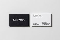 a business card with the word dark matter printed on it