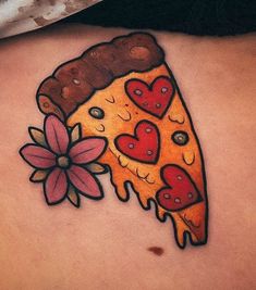 a piece of pizza with hearts and flowers on the side of her stomach is shown