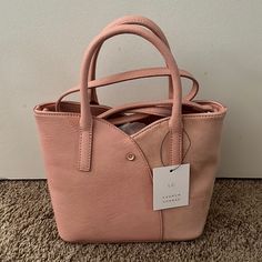 Lauren Conrad Pink Tulip Polyester Crossbody Bag. Nwt 9.5"H X 8"W X 3.5"D Handle: 5.25'' Drop Strap Length: 21.5"-24" Zipper And Magnetic Snap Closure Rose Gold-Tone Hardware Interior: 2 Zip Pockets, 1 Slip Pocket Pink Crossbody Bucket Bag With Top Carry Handle, Blush Crossbody Shoulder Bag With Top Carry Handle, Blush Crossbody Bag With Top Carry Handle, Blush Crossbody Satchel For Everyday Use, Blush Crossbody Satchel For Daily Use, Spring Shopping Shoulder Bag In Blush, Blush Shoulder Bag For Everyday Use In Spring, Spring Blush Shoulder Bag For Shopping, Spring Blush Bag With Adjustable Strap