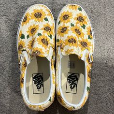 Rare Classic Slip On Vans - Sunflower Print. Men’s Size 6/Women’s Size 7.5. Listed On The Goat Website For $232. Brand New, Never Worn. Painted Slip On Vans Sun Flowers, Golden Yellow Vans, Vans Women Sunfkower, Affordable Vans Slip-on Sneakers, Yellow Low-top Vans Sneakers, Vans Yellow, Camo Shoes, Authentic Vans, Vans Slip On